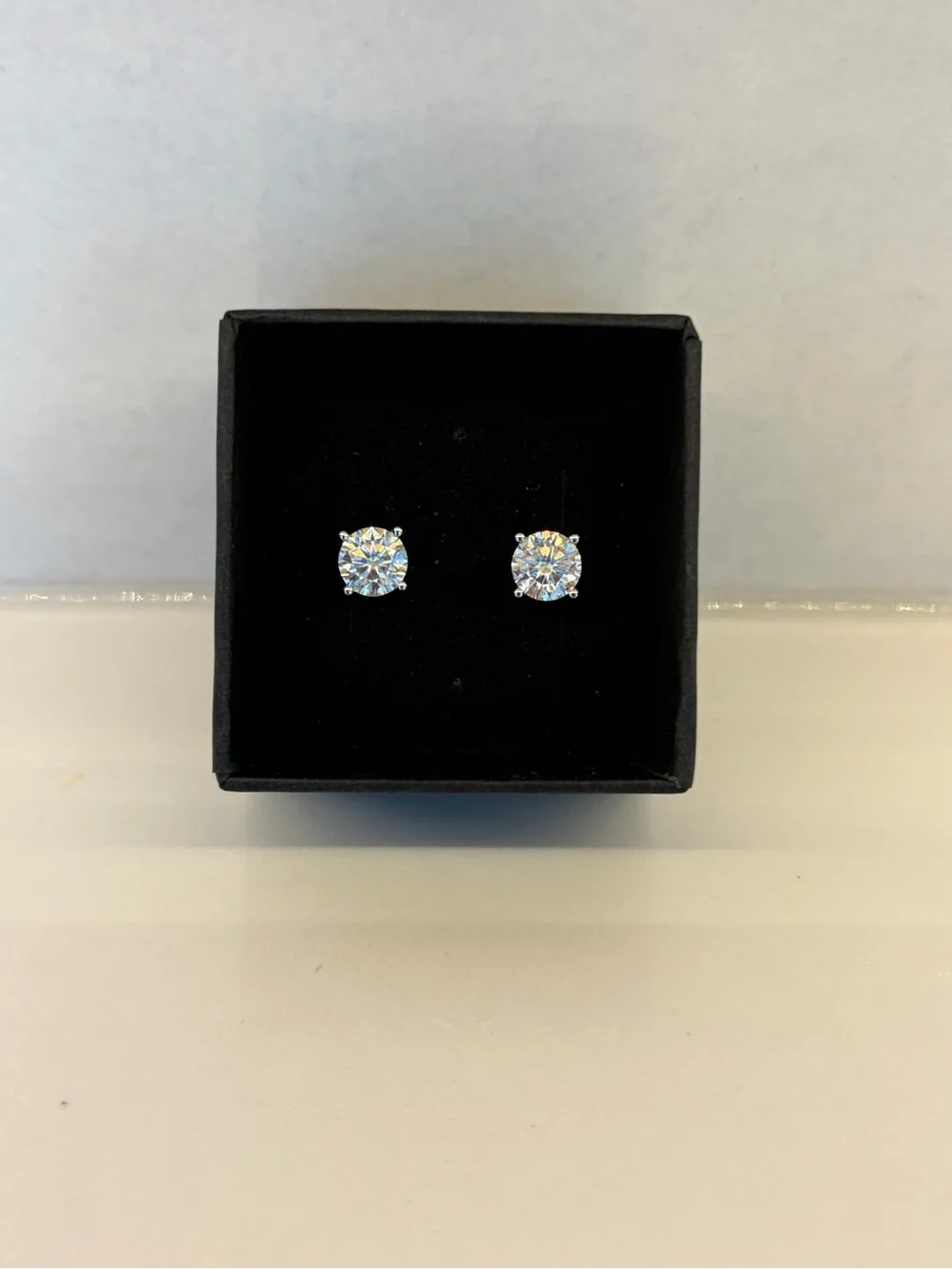 Round White Solitaire Stud Earring in Silver Prong Setting